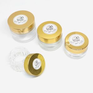 محبرة زجاجية بغطاء ذهبي